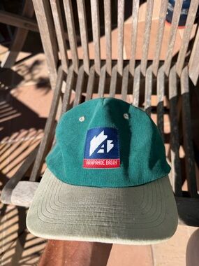 Green Baseball Cap with Red & Blue Patch